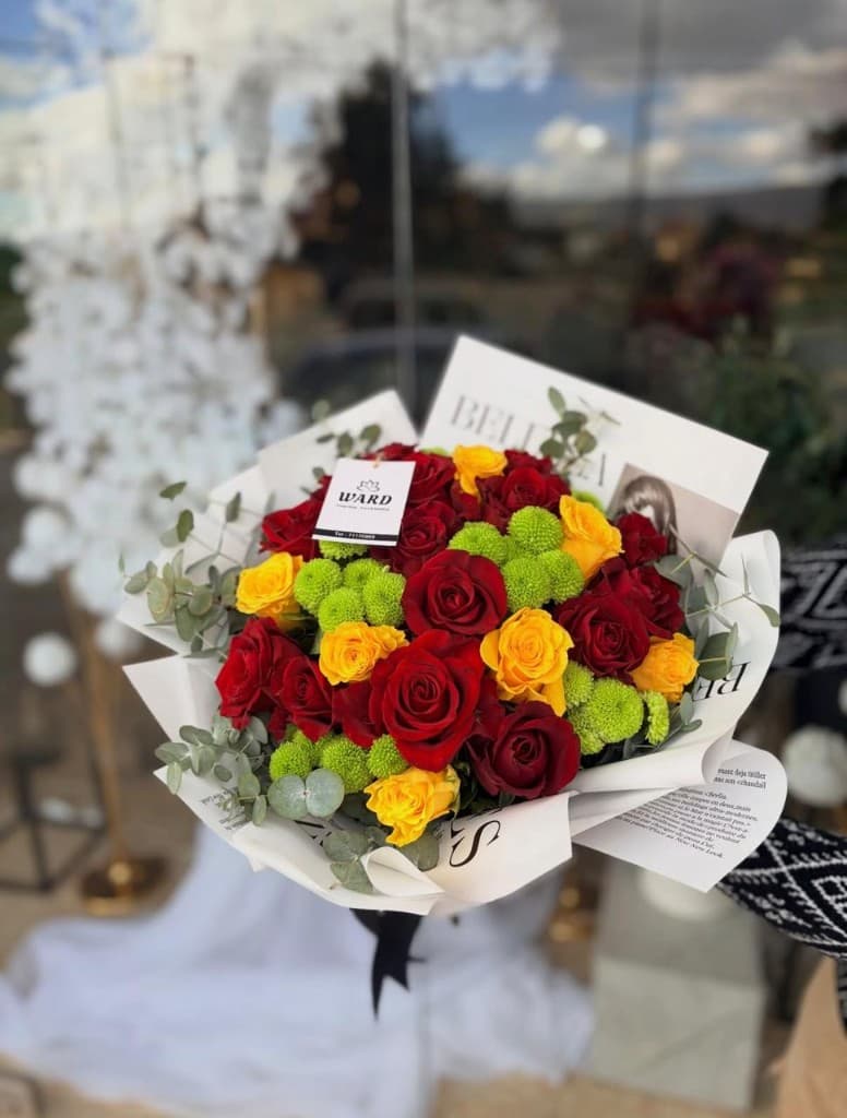 Ward Floral Boutique bouquet with roses and chrysanthemums